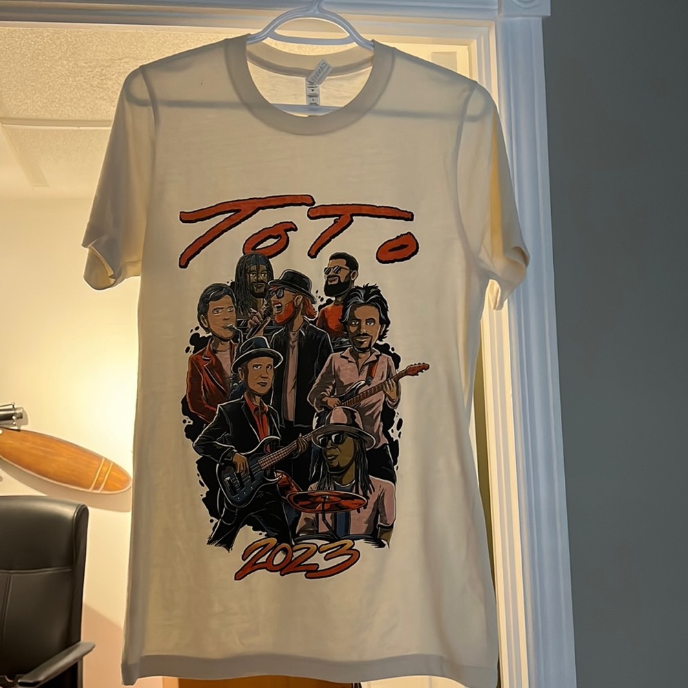 Free with 50$ plus purchase***Concert TShirt Group is ToTo